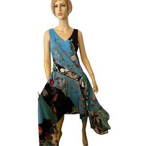 Gorgeous Asymmetrical Sleeveless Eclectic patterned!! Free and Flows nicely.,💙